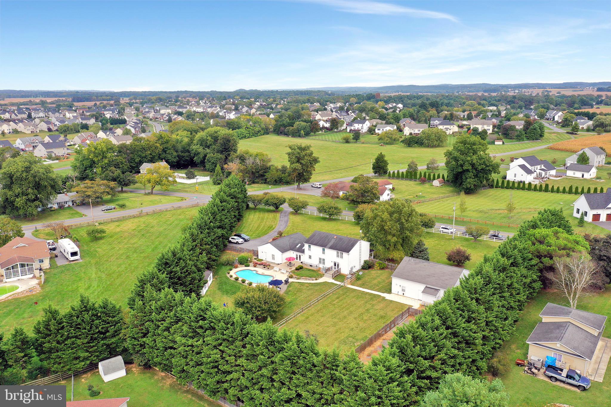 Aerial of tree-lined property