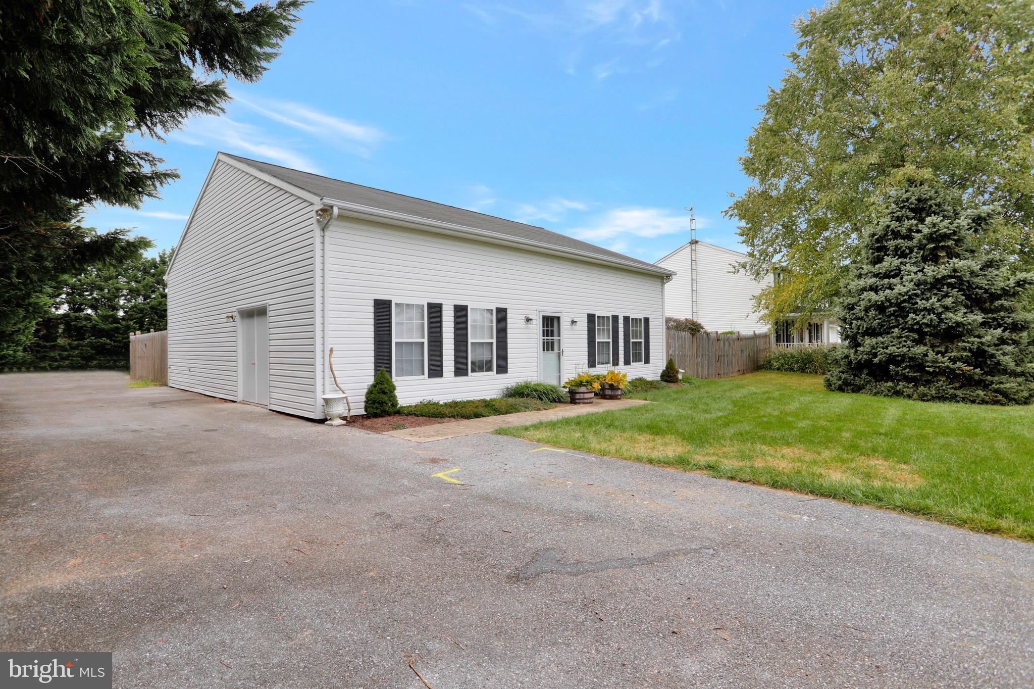 Carriage house, currently home office & storage