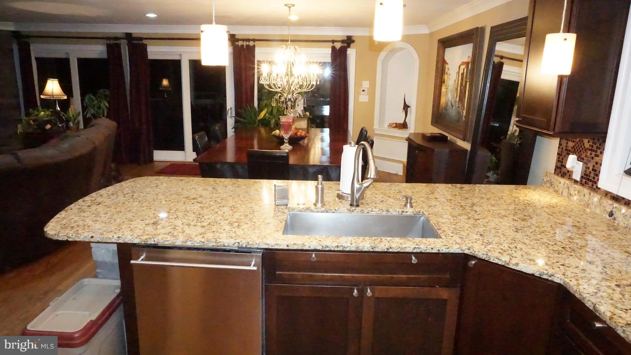 9105 Cuckold Point Road Baltimore, MD 21219 - Photo 128 of 150 Pendant lights over 10' peninsula