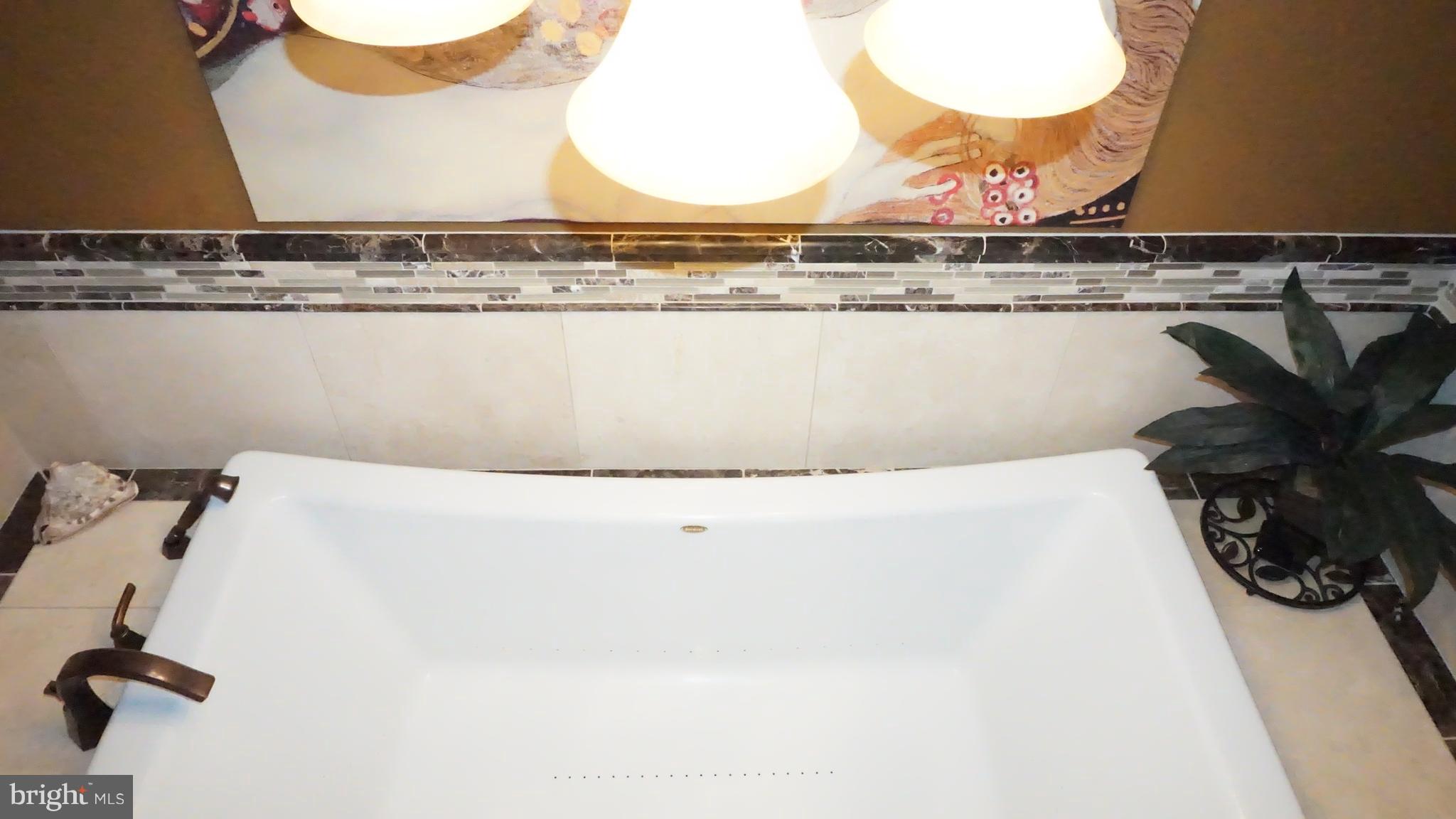9105 Cuckold Point Road Baltimore, MD 21219 - Photo 18 of 150 Spa like jetted tub with tv's