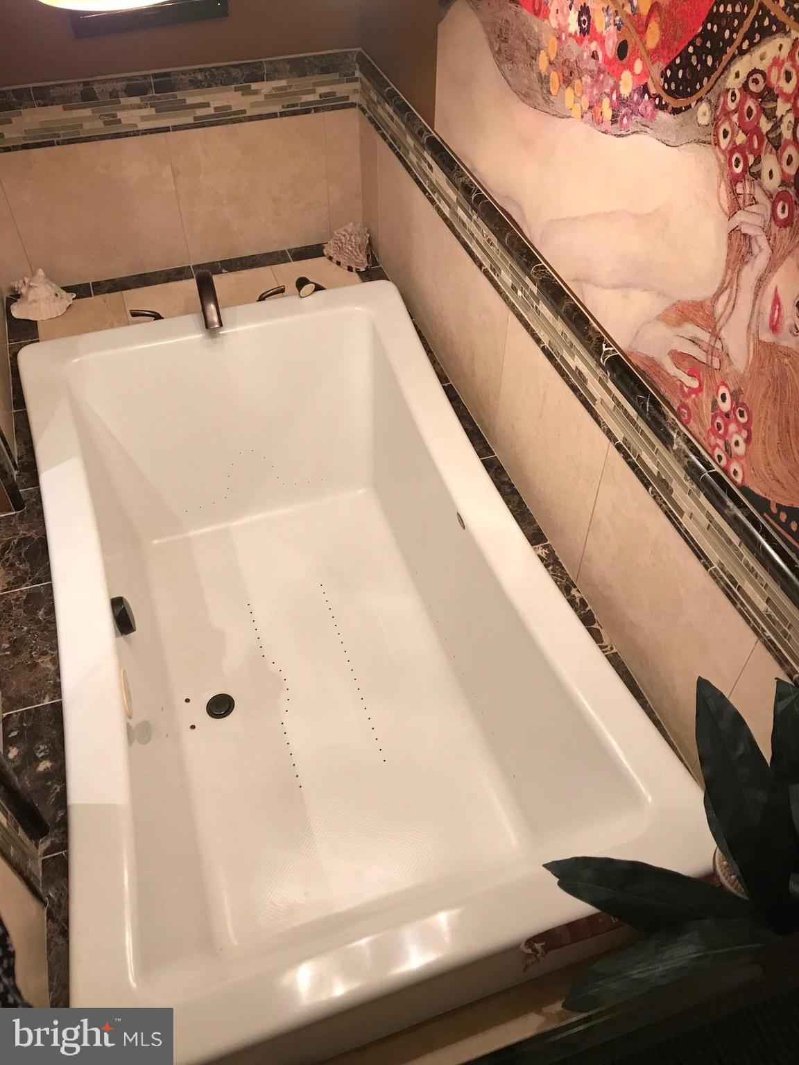 9105 Cuckold Point Road Baltimore, MD 21219 - Photo 22 of 150 7' Jetted Tub w/TV's on each side to relax