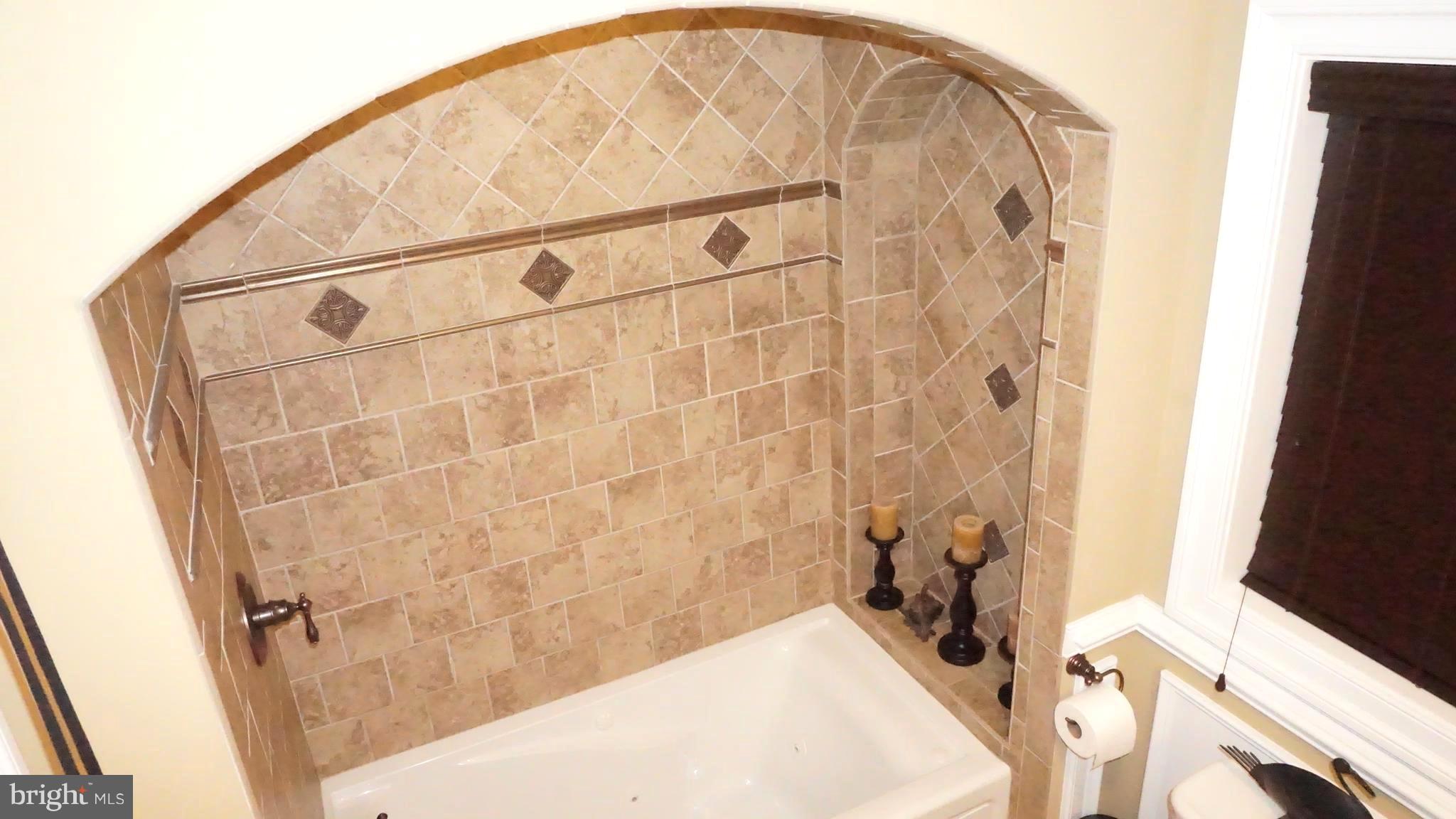 9105 Cuckold Point Road Baltimore, MD 21219 - Photo 33 of 150 Main level full bath looks like a spa