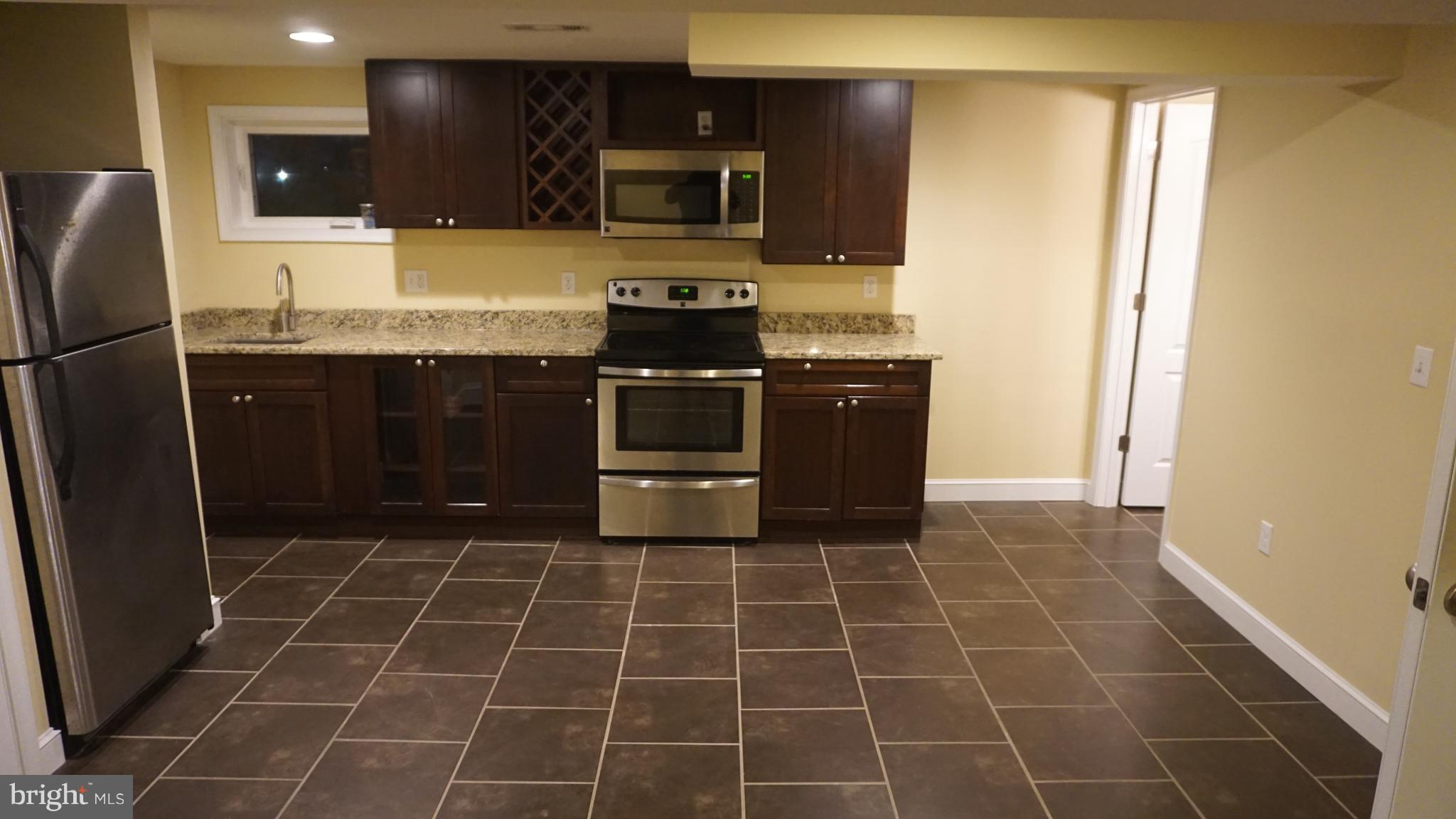9105 Cuckold Point Road Baltimore, MD 21219 - Photo 68 of 150 Apartment Kitchen with Kraft Main Cabinetry