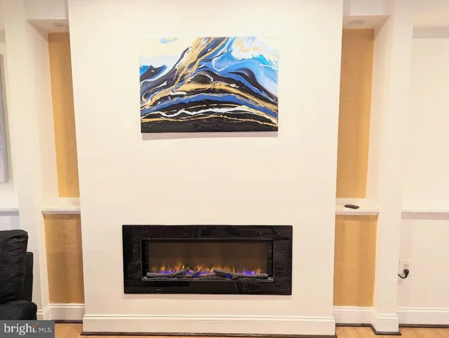 a living room with a fireplace