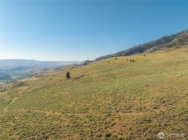 a view of ocean with mountains