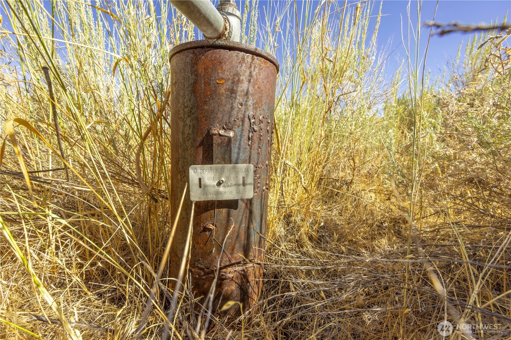 0 Goat Ridge, Unit 6 Pateros, WA 98846 - Photo 38 of 39 a door with a trees in front of it