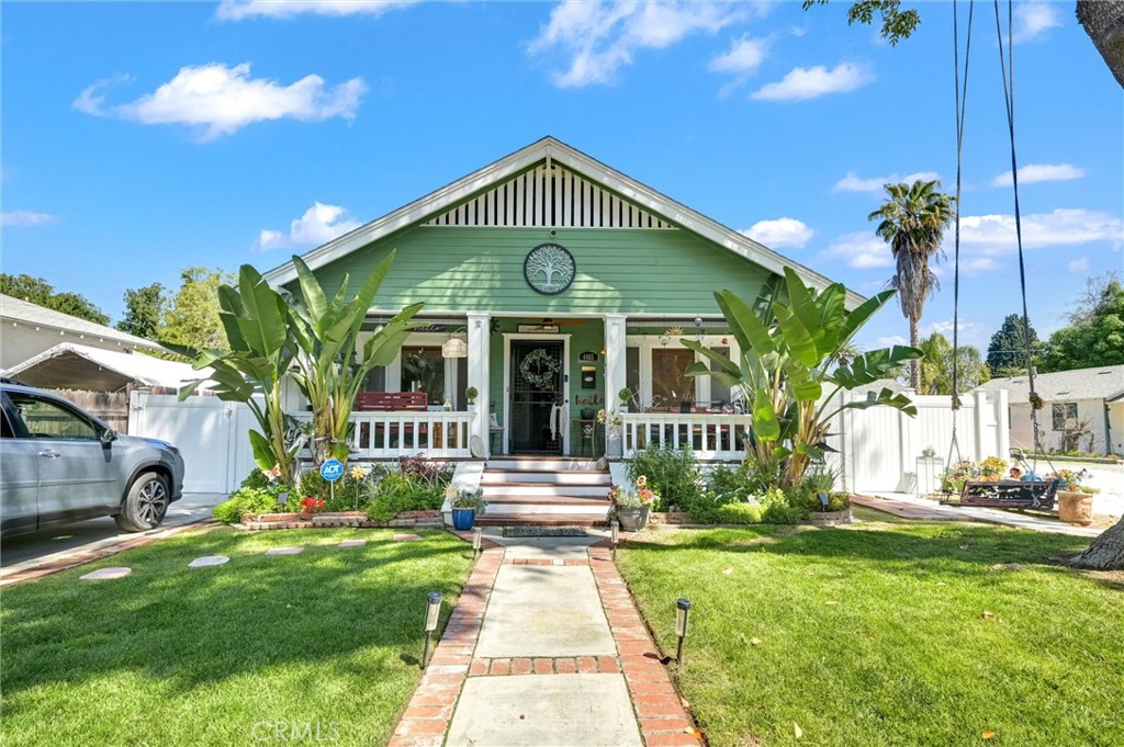 4465 Edgewood Place Riverside, CA 92506 - Photo 1 of 1 a front view of house with a garden