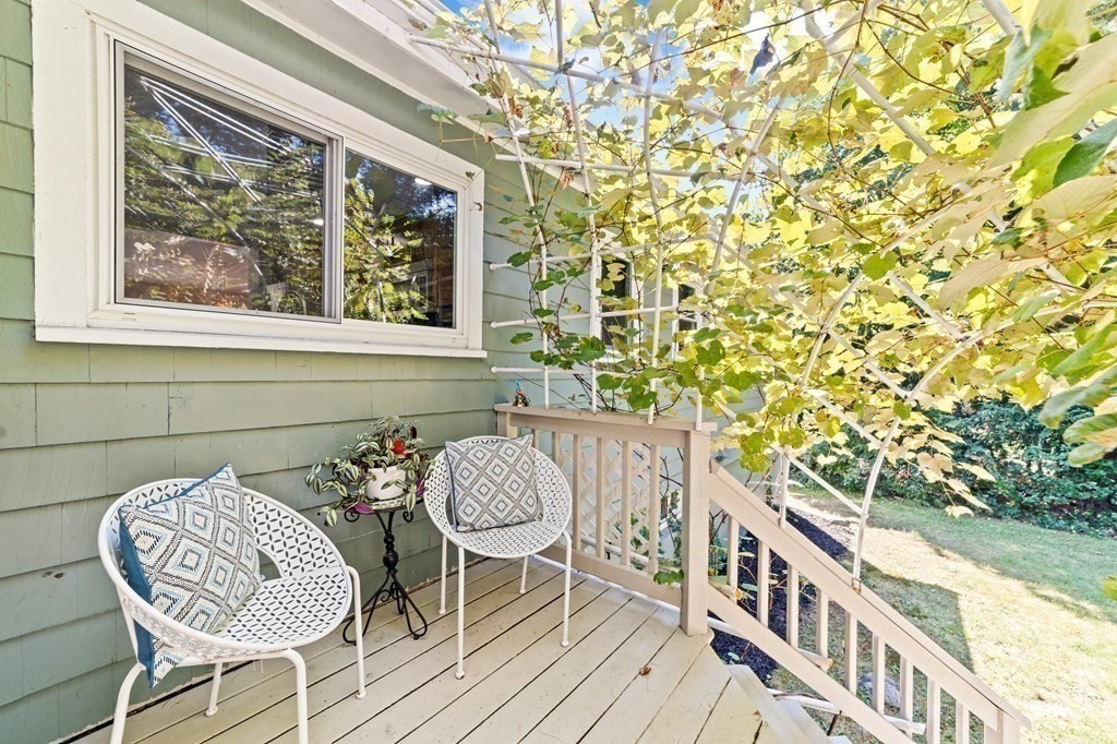 545 Potter Road Framingham, MA 01701 - Photo 24 of 42 a view of a chairs and table in patio