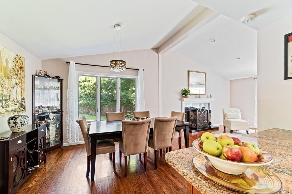 545 Potter Road Framingham, MA 01701 - Photo 3 of 42 a dining room with furniture wooden floor and a large window