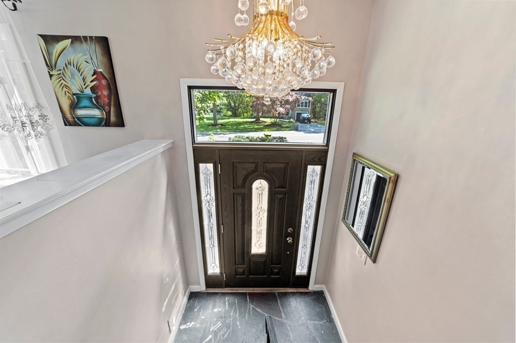 545 Potter Road Framingham, MA 01701 - Photo 32 of 42 a view of entryway with window and hallway