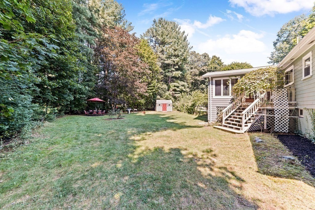 545 Potter Road Framingham, MA 01701 - Photo 33 of 42 a view of a house with a yard