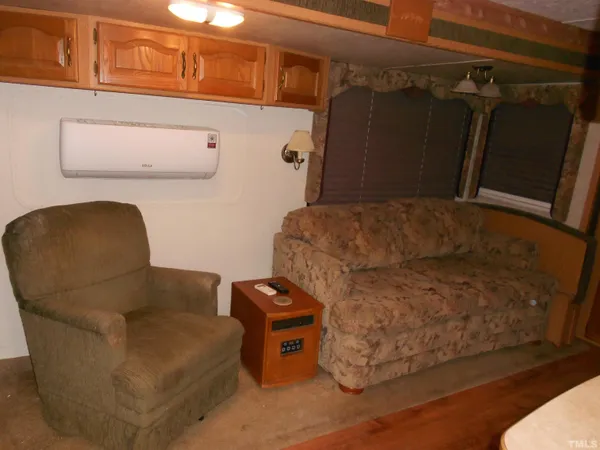 a kitchen with a refrigerator and a sink