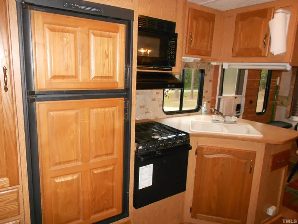 a bathroom with a sink and a window