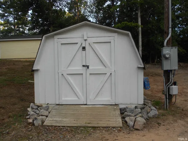 a front view of a house with garage
