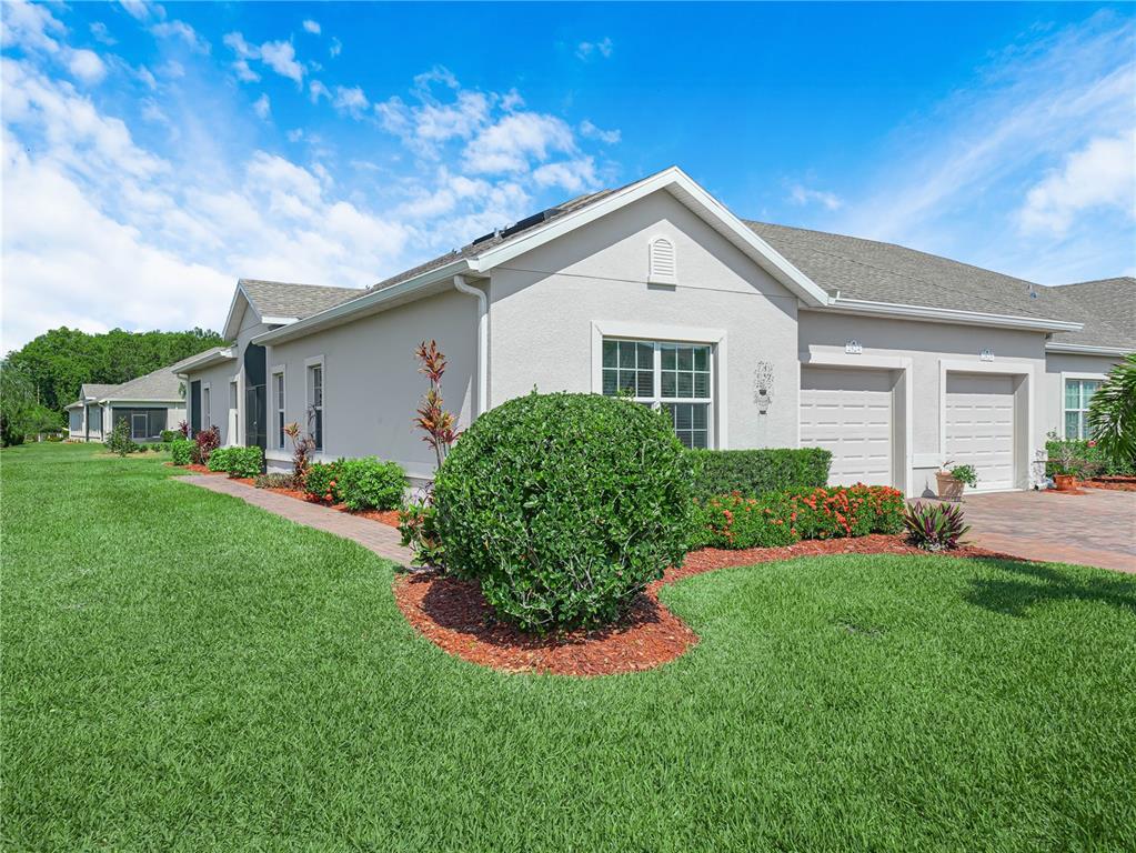 2824 Attwater Loop Winter Haven, FL 33884 - Photo 1 of 1 front view of a house with a yard