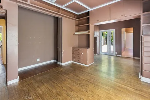 a view of a livingroom with wooden floor