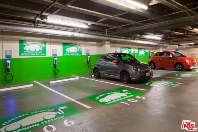 a view of parking garage with cars