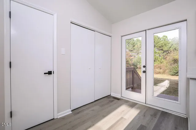 a view of a bathroom with a glass door