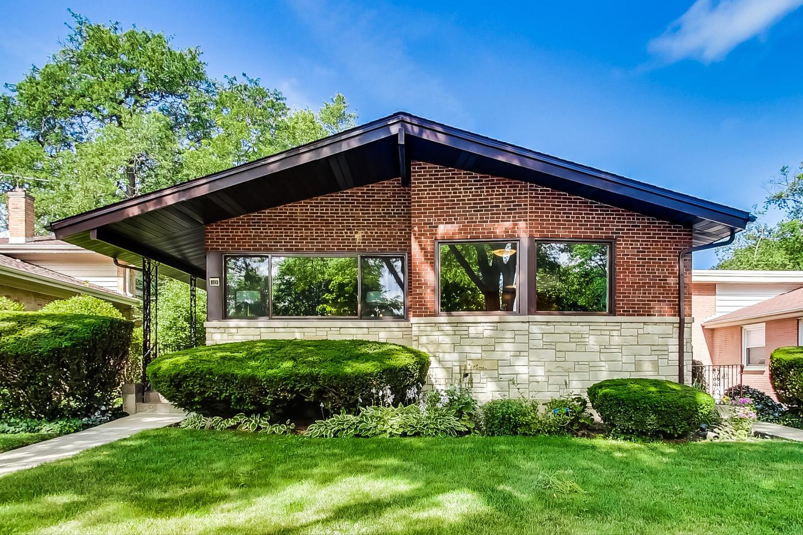 8948 Forestview Road Evanston, IL 60203 - Photo 2 of 37 a front view of house with yard