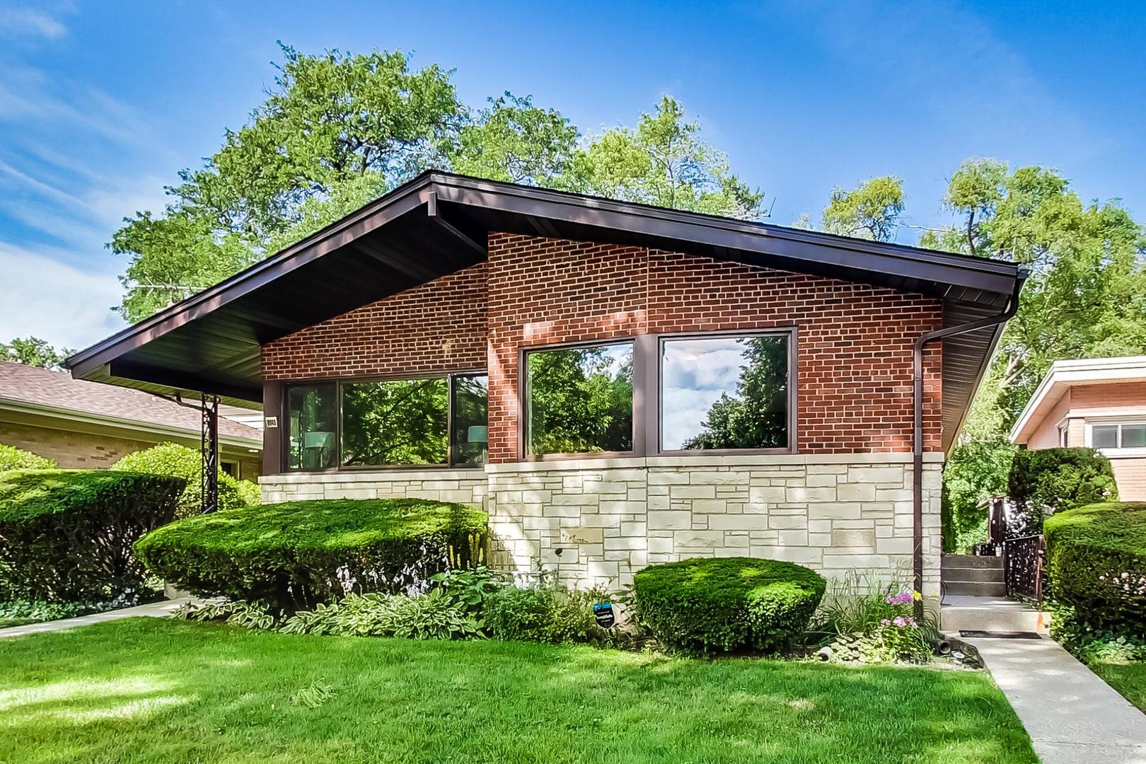 8948 Forestview Road Evanston, IL 60203 - Photo 3 of 37 a view of house with a yard