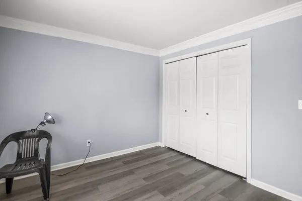 a view of room with hardwood floor