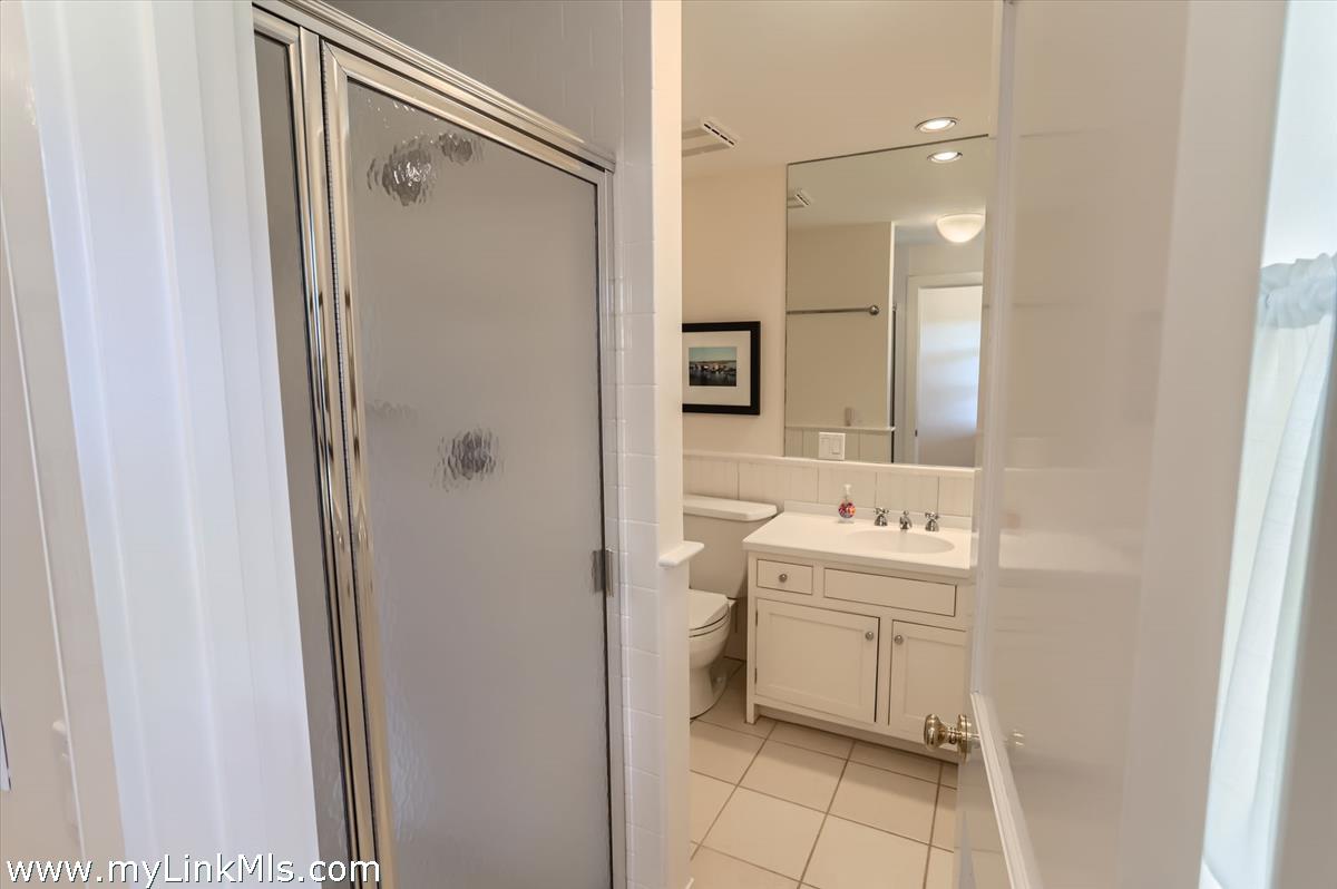 78 Hammett Road Chilmark, MA 02535 - Photo 45 of 53 a bathroom with a sink a toilet and shower