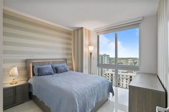 a view of a room with wooden floor and balcony