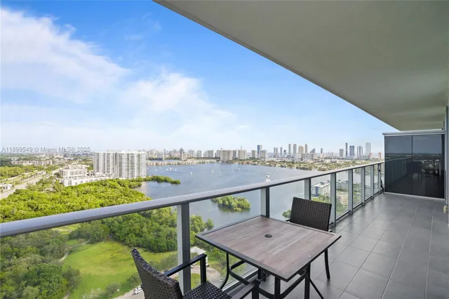 a view of a balcony with city