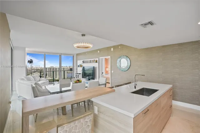a kitchen with counter top space cabinets and stainless steel appliances