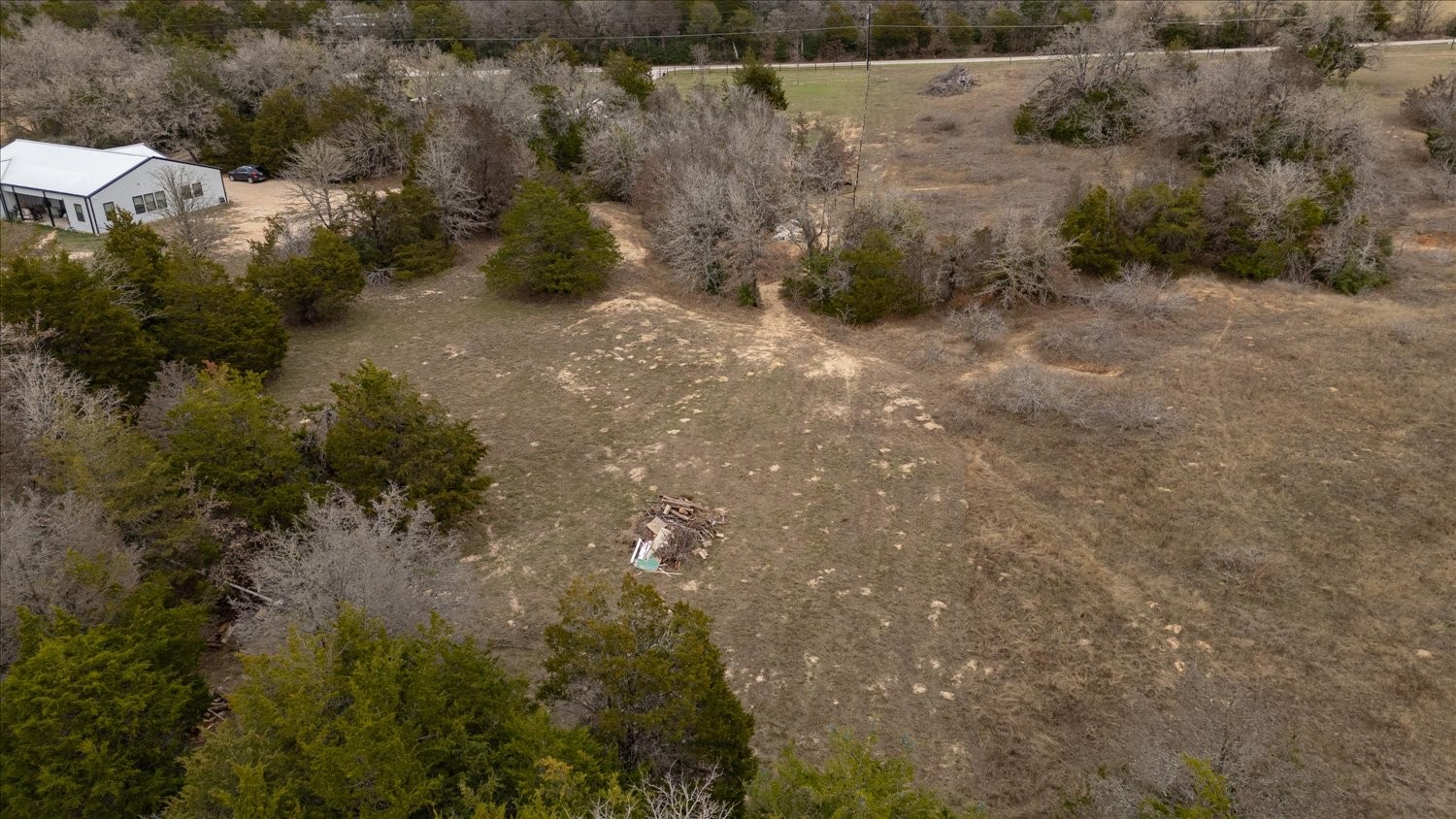 145 Eely Road McDade, TX 78650 - Photo 6 of 22 back of property