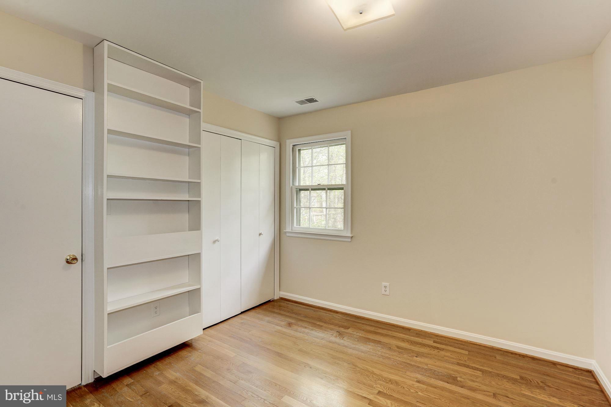 11037 Ring Road Reston, VA 20190 - Photo 15 of 30 a view of an empty room with a window