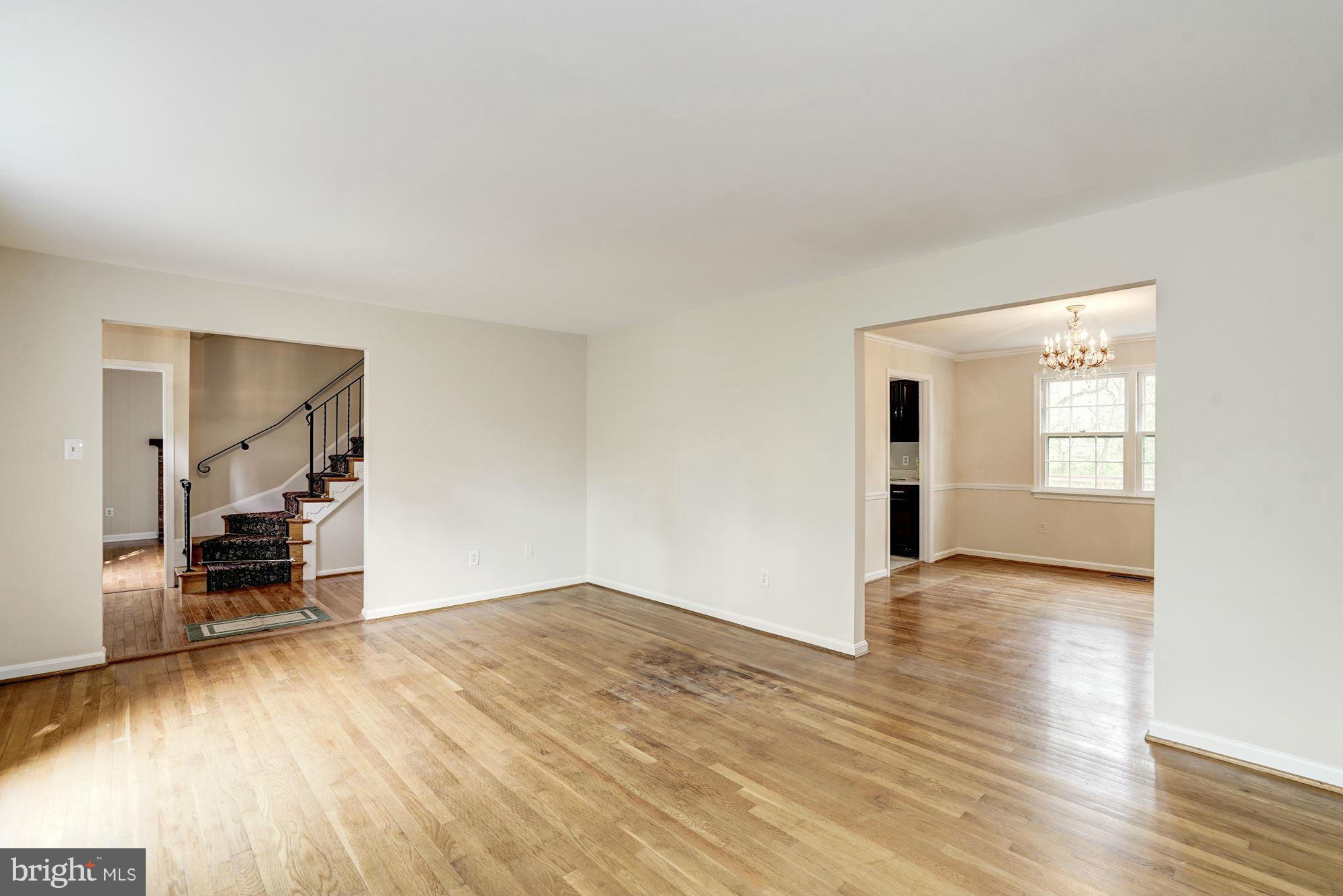 11037 Ring Road Reston, VA 20190 - Photo 16 of 30 a view of empty room with wooden floor and fan