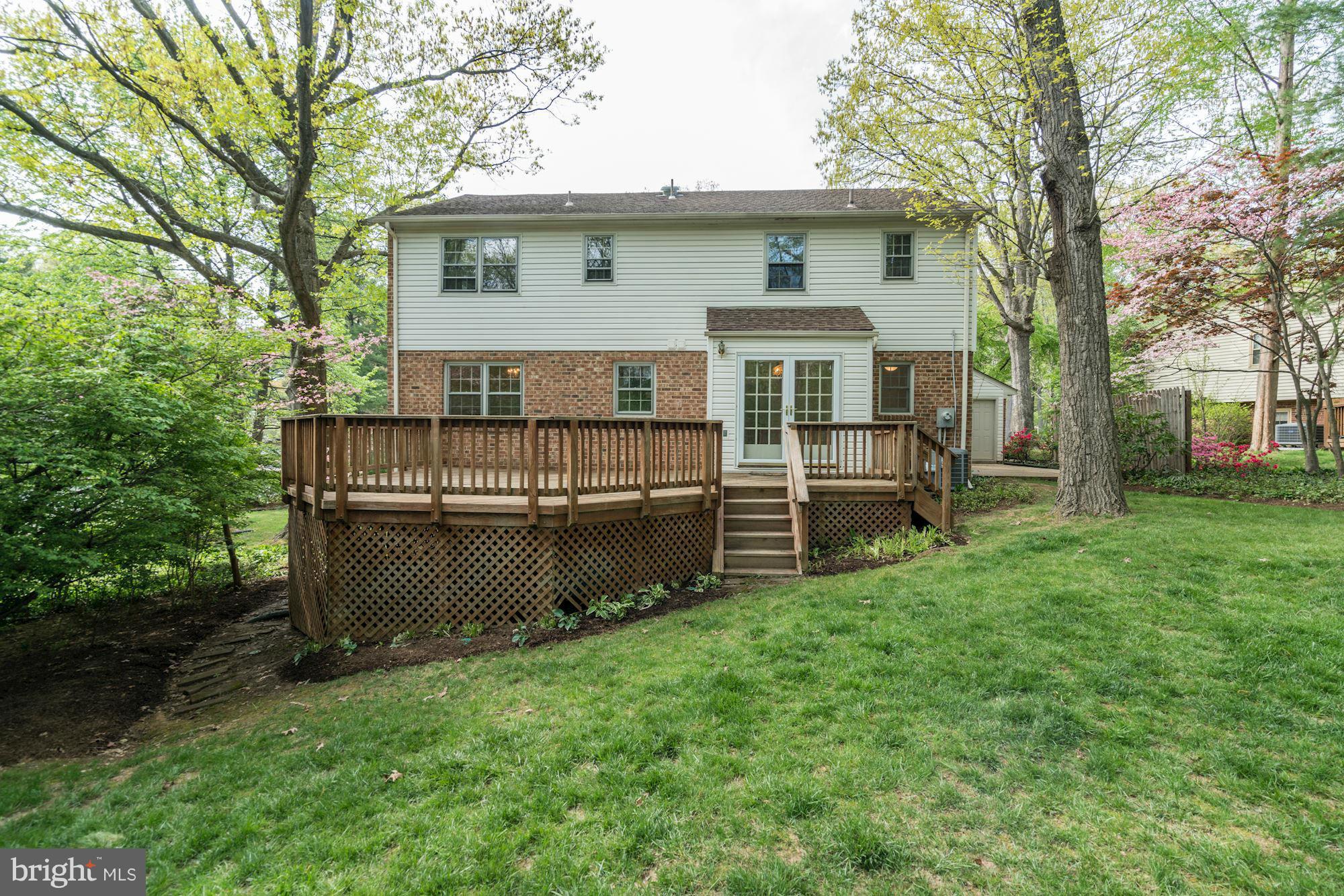 11037 Ring Road Reston, VA 20190 - Photo 29 of 30 a view of a house with a backyard