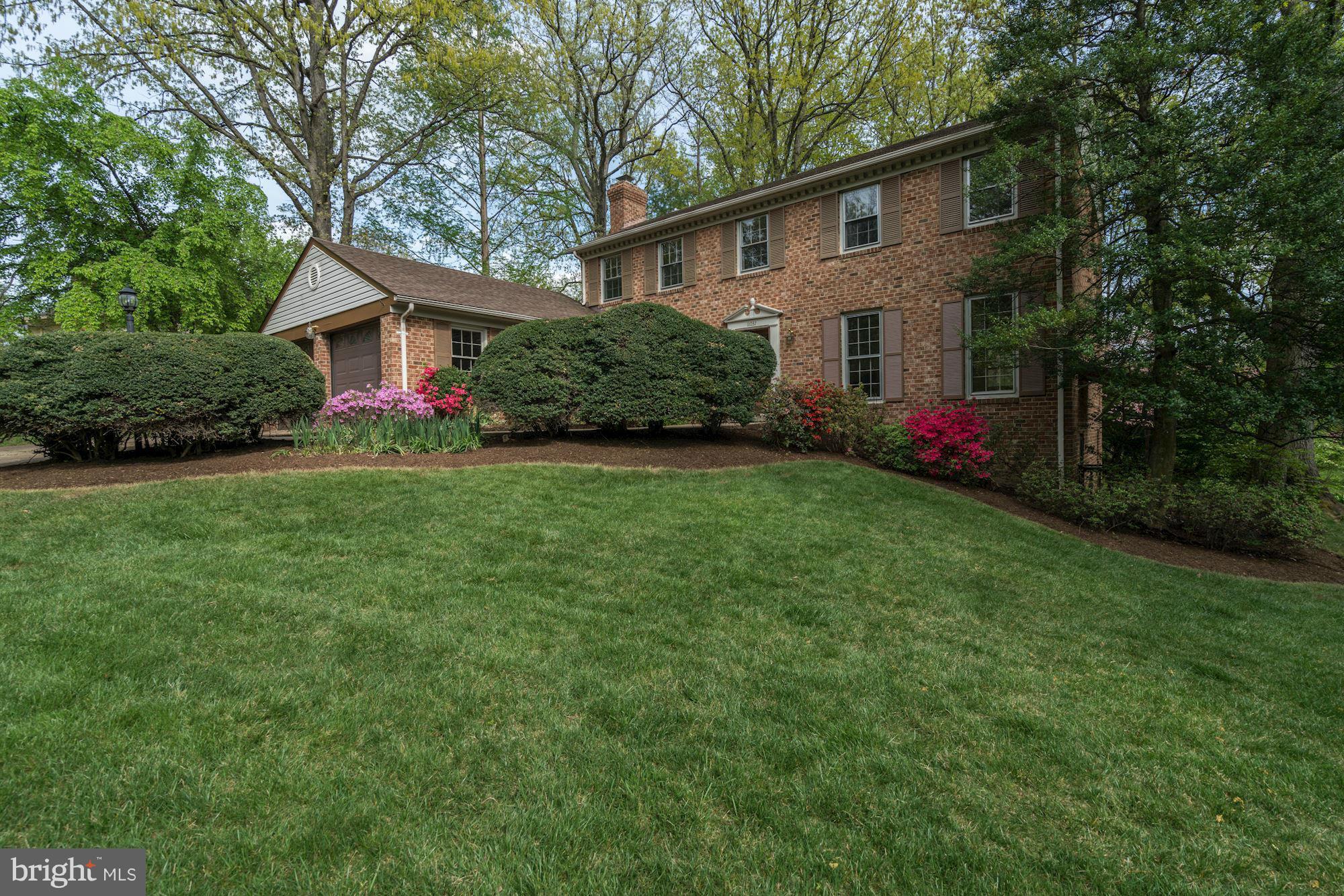 11037 Ring Road Reston, VA 20190 - Photo 7 of 30 a front view of house with yard and green space