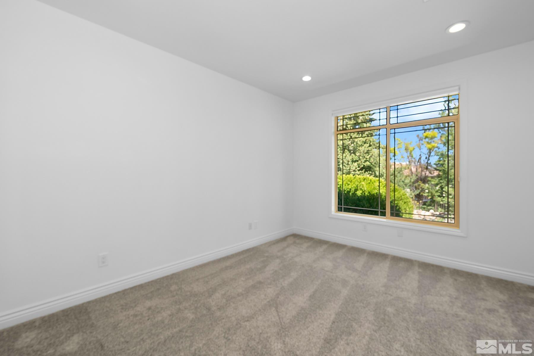 13000 Silver Wolf Road Reno, NV 89511 - Photo 22 of 43 an empty room with a window