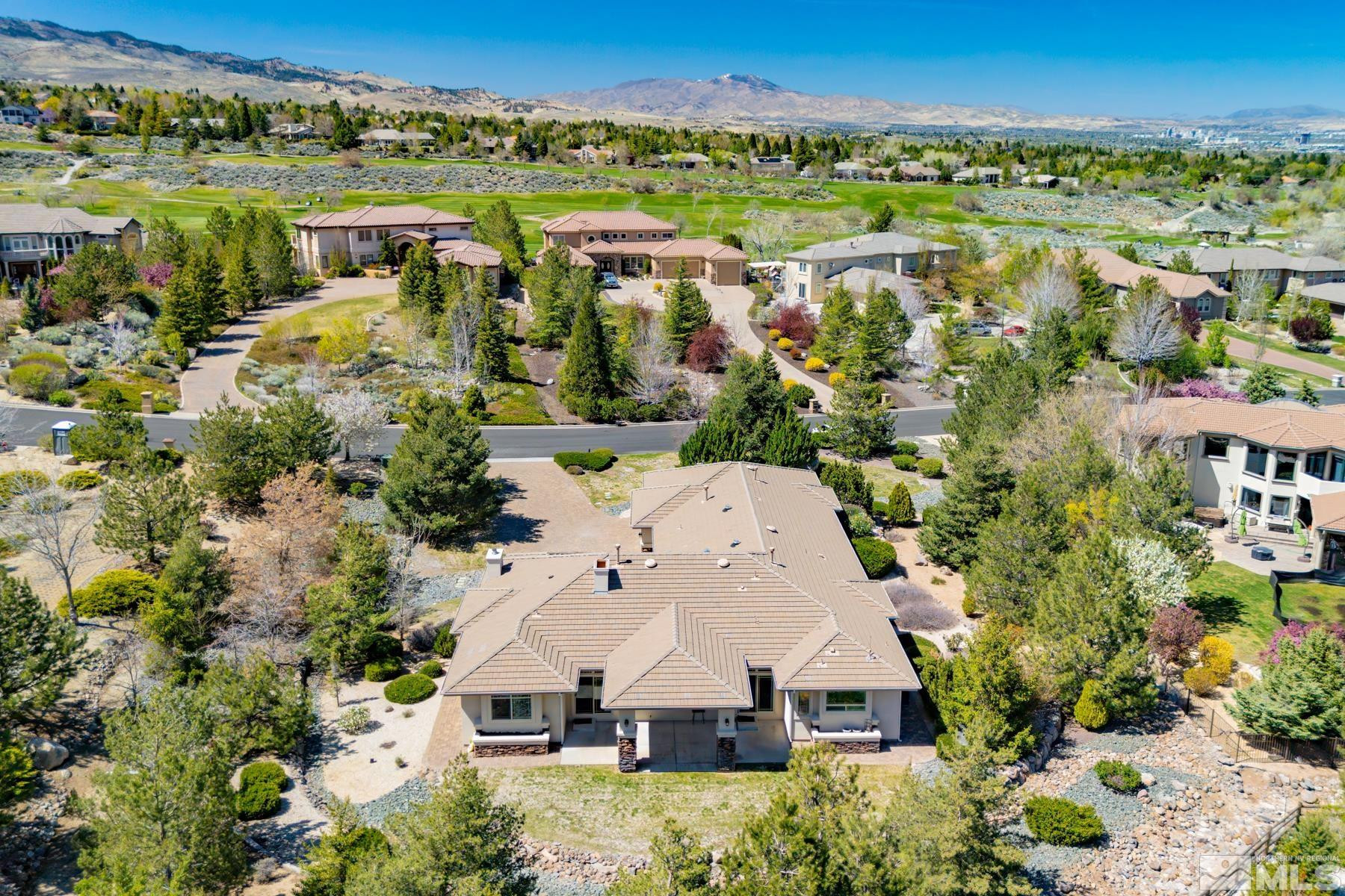 13000 Silver Wolf Road Reno, NV 89511 - Photo 38 of 43 an aerial view of a house with a yard