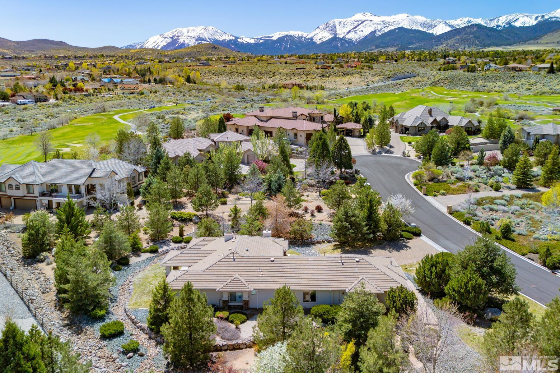 13000 Silver Wolf Road Reno, NV 89511 - Photo 39 of 43 an aerial view of residential houses with outdoor space and river