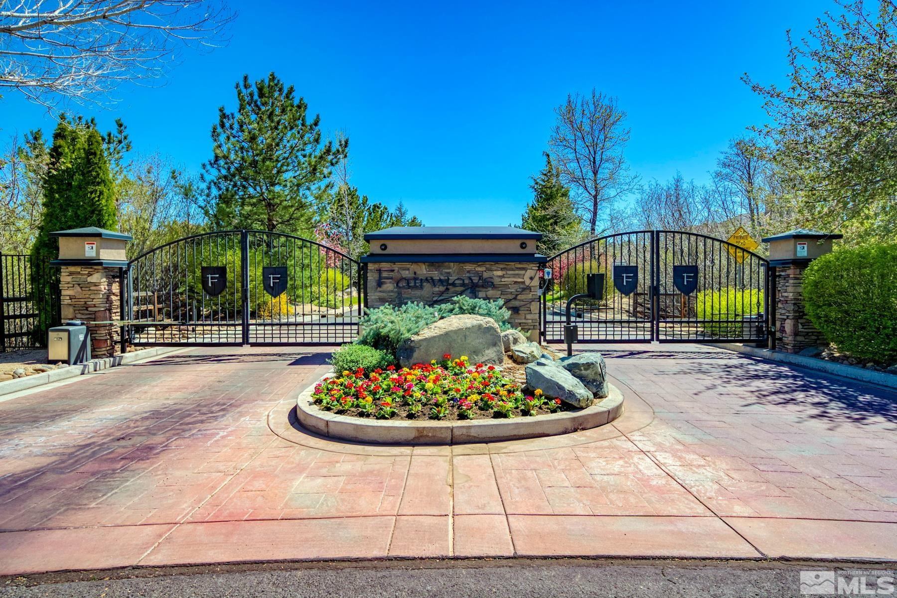 13000 Silver Wolf Road Reno, NV 89511 - Photo 43 of 43 a front view of a house with a garden