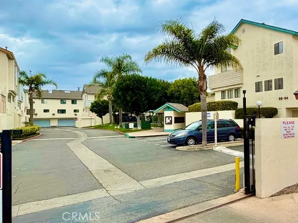 a view of a street with houses