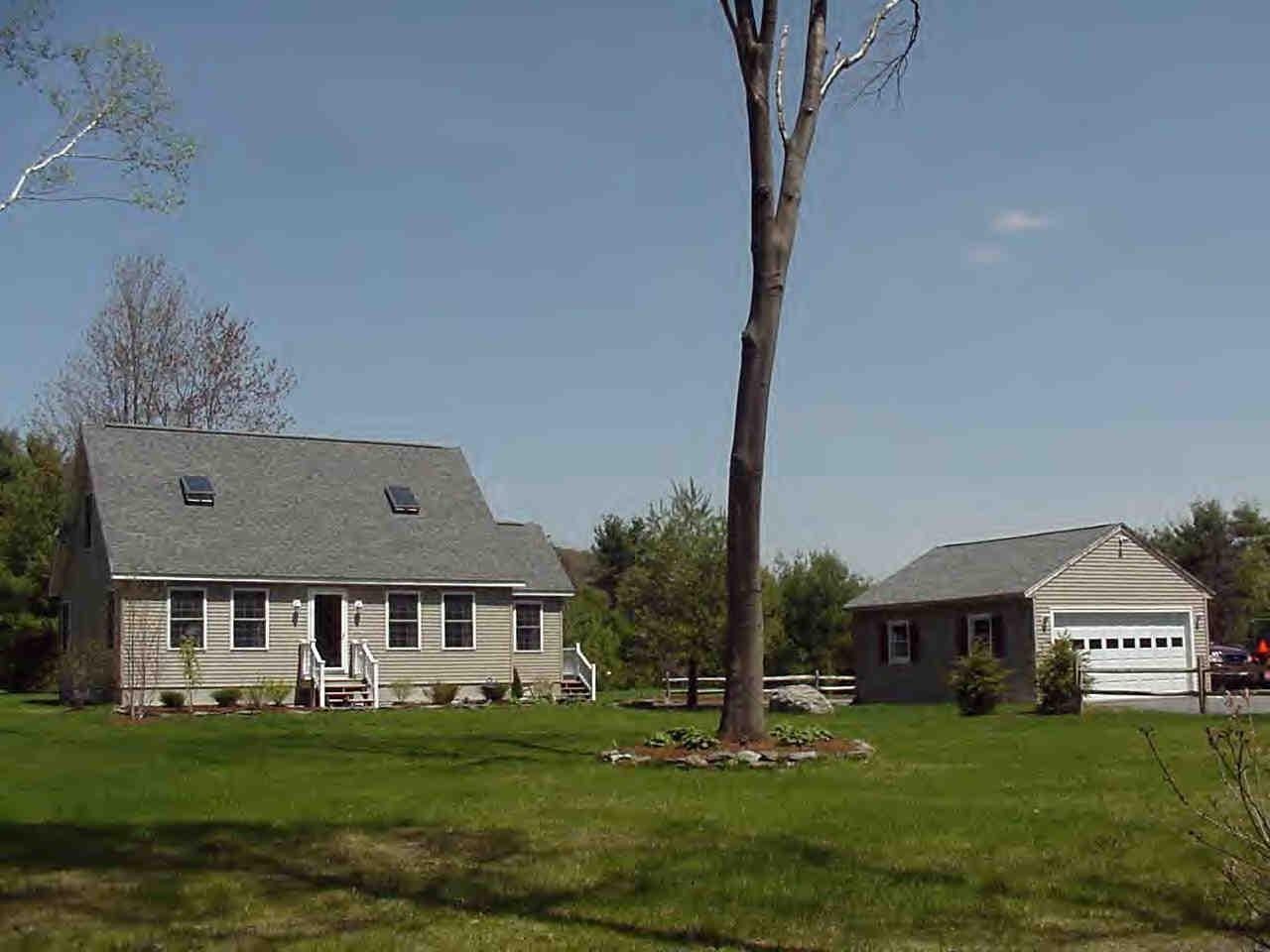18 Smith Road West Stockbridge, MA 01266 - Photo 1 of 7 a view of a big house with a big yard and large trees