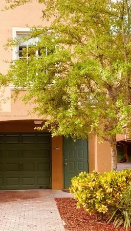 a view of a backyard of the house