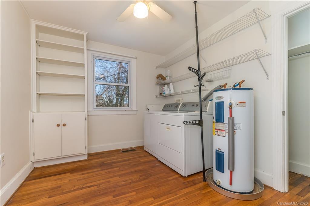 243 Woodland Road Tryon, NC 28782 - Photo 16 of 24 a view of a room with storage and utility