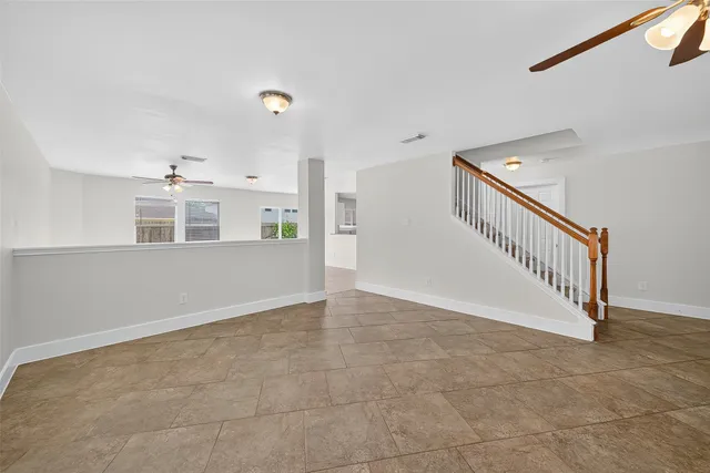 a view of a livingroom with a staircase