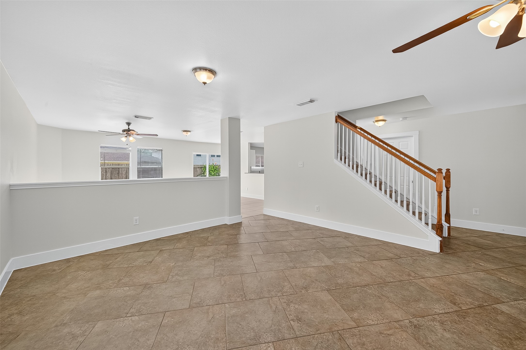 20907 Baronsledge Lane Katy, TX 77449 - Photo 11 of 50 a view of a livingroom with a staircase