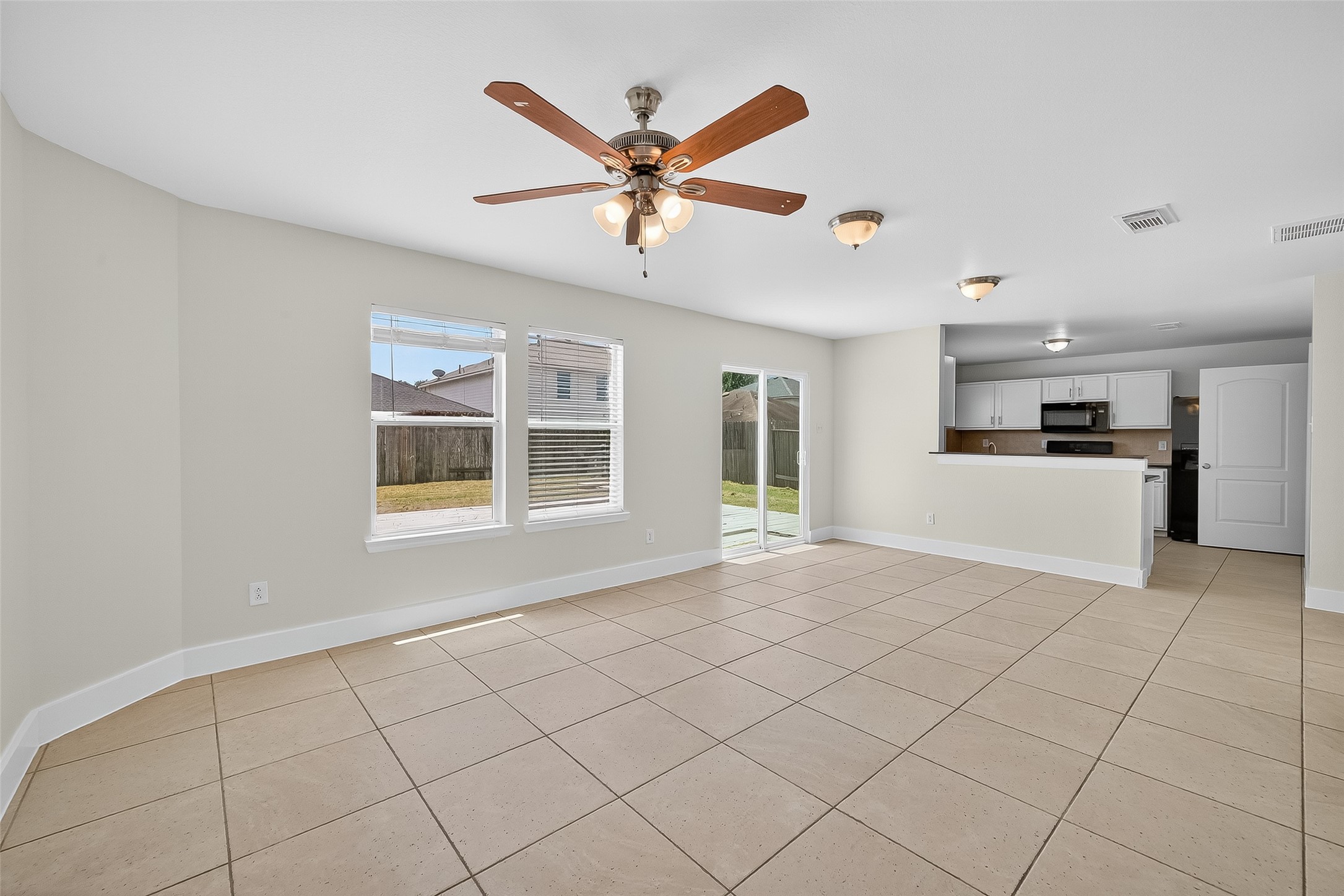 20907 Baronsledge Lane Katy, TX 77449 - Photo 15 of 50 a view of a livingroom with a ceiling fan and window