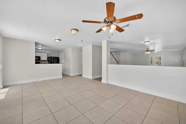 a view of a livingroom with a staircase