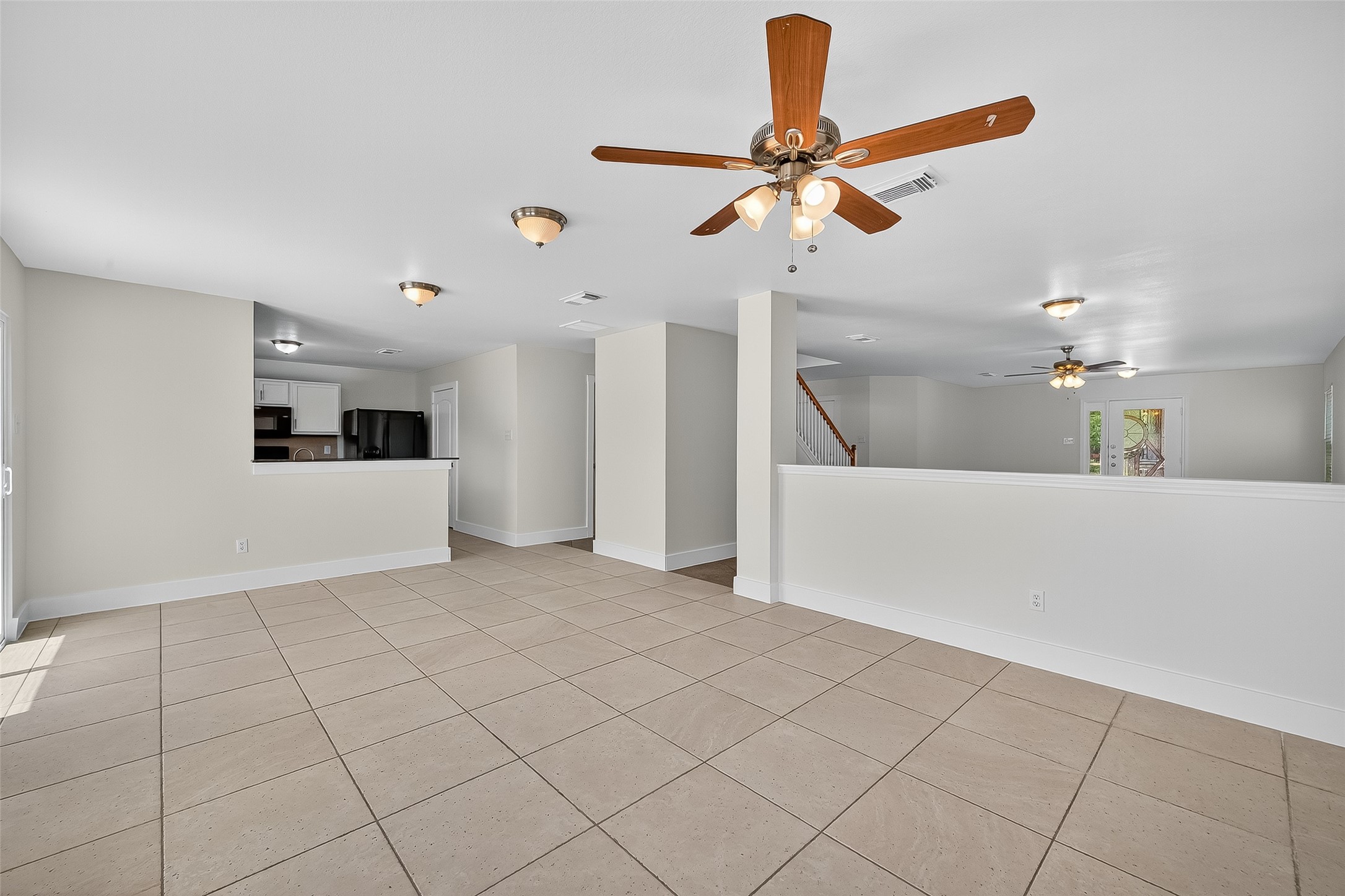 20907 Baronsledge Lane Katy, TX 77449 - Photo 16 of 50 a view of a livingroom with a staircase
