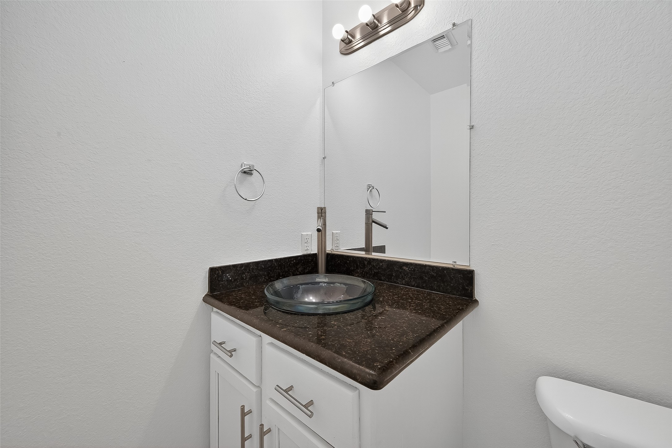 20907 Baronsledge Lane Katy, TX 77449 - Photo 26 of 50 a bathroom with a granite countertop sink and a mirror