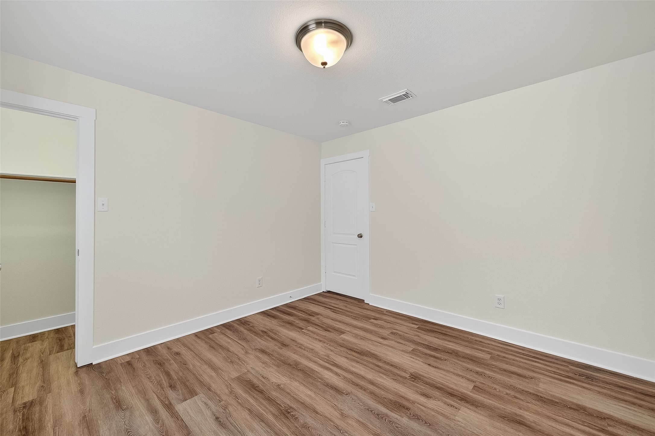 20907 Baronsledge Lane Katy, TX 77449 - Photo 30 of 50 a view of room with wooden floor and fan