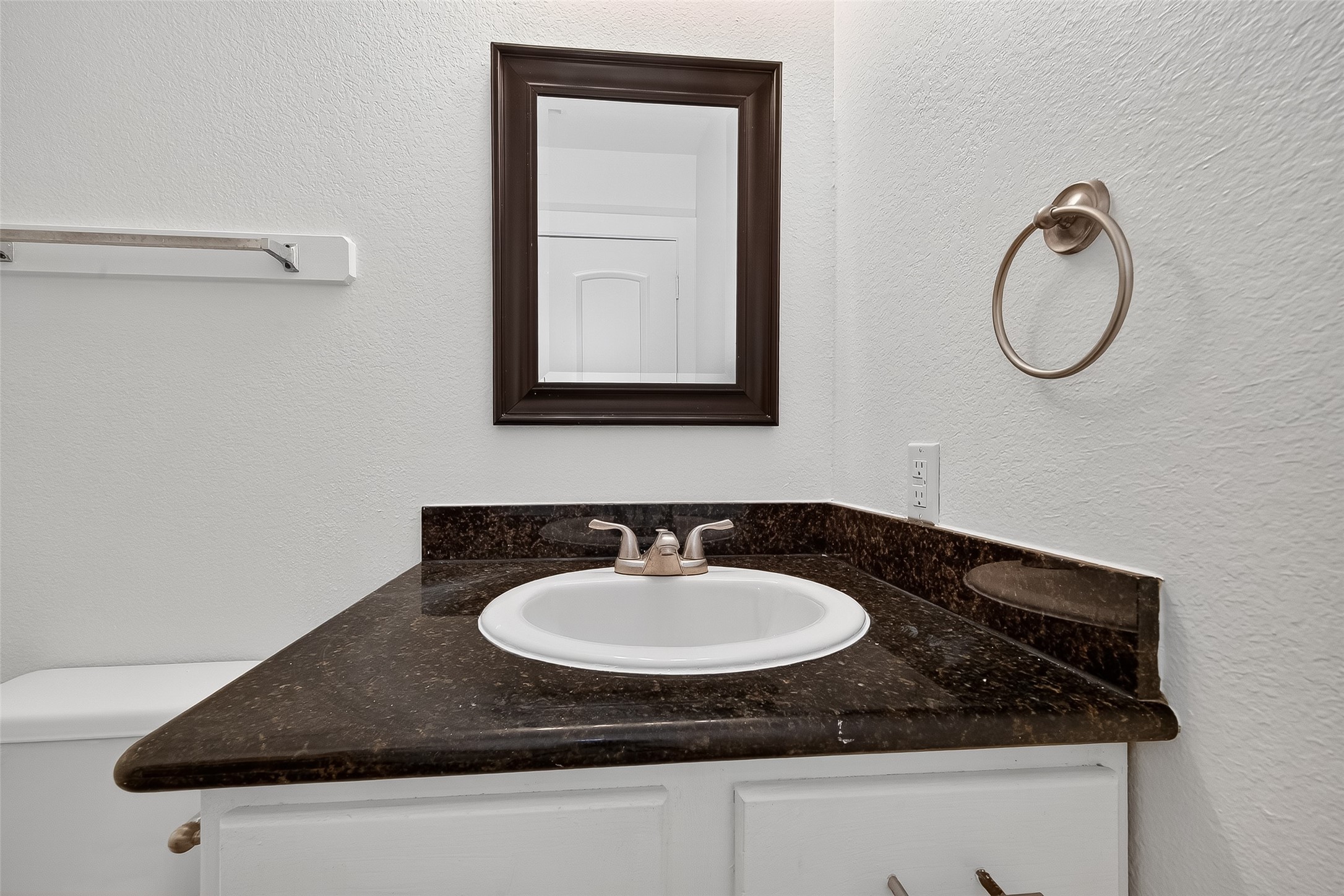 20907 Baronsledge Lane Katy, TX 77449 - Photo 33 of 50 a bathroom with a sink and a mirror
